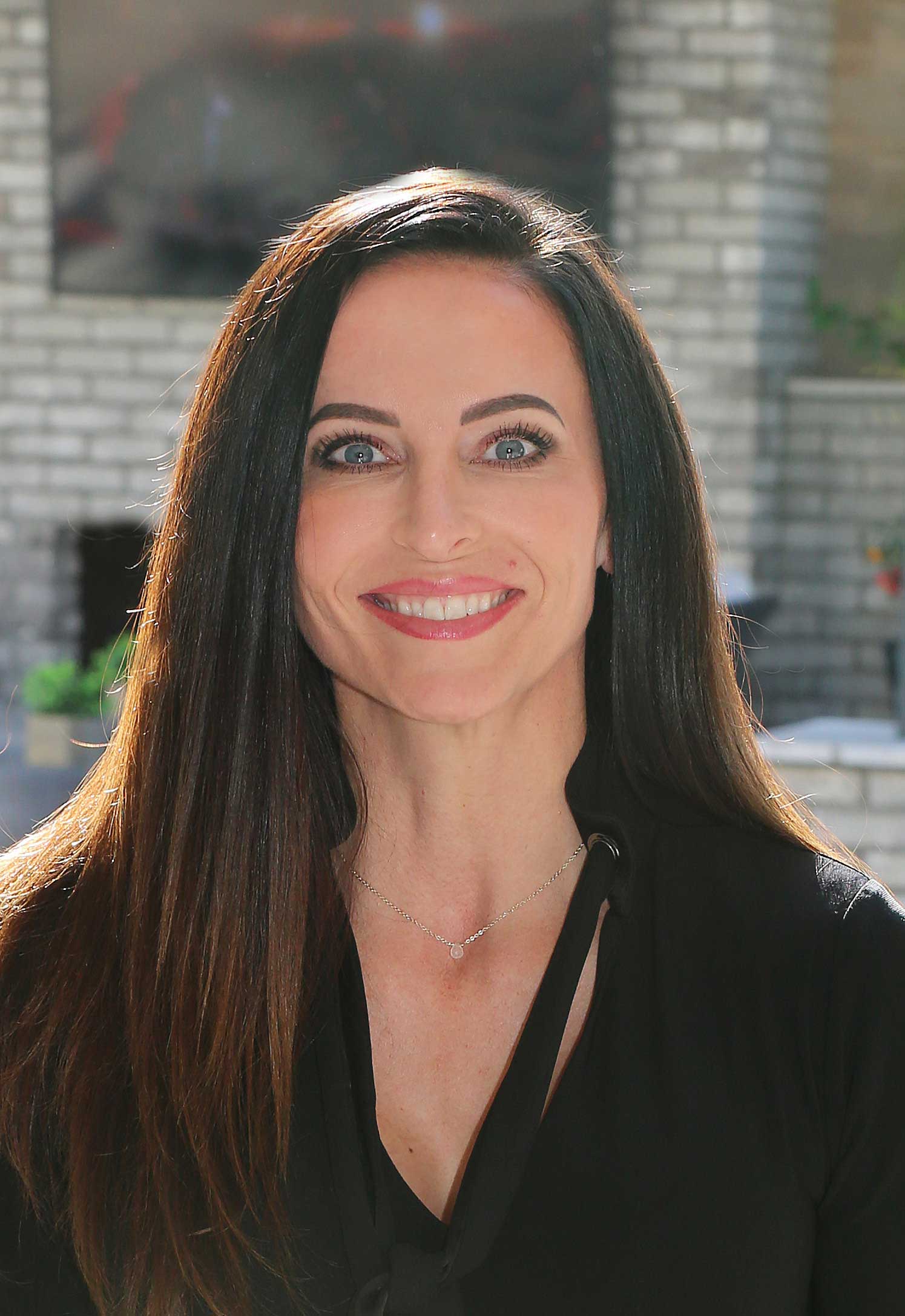 Portrait of April Anderson, Realtor and Broker/Owner of Queen Creek Real Estate